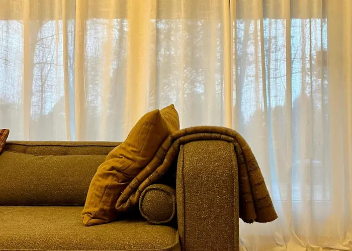 Be Surrounded By Trees In A Thatched